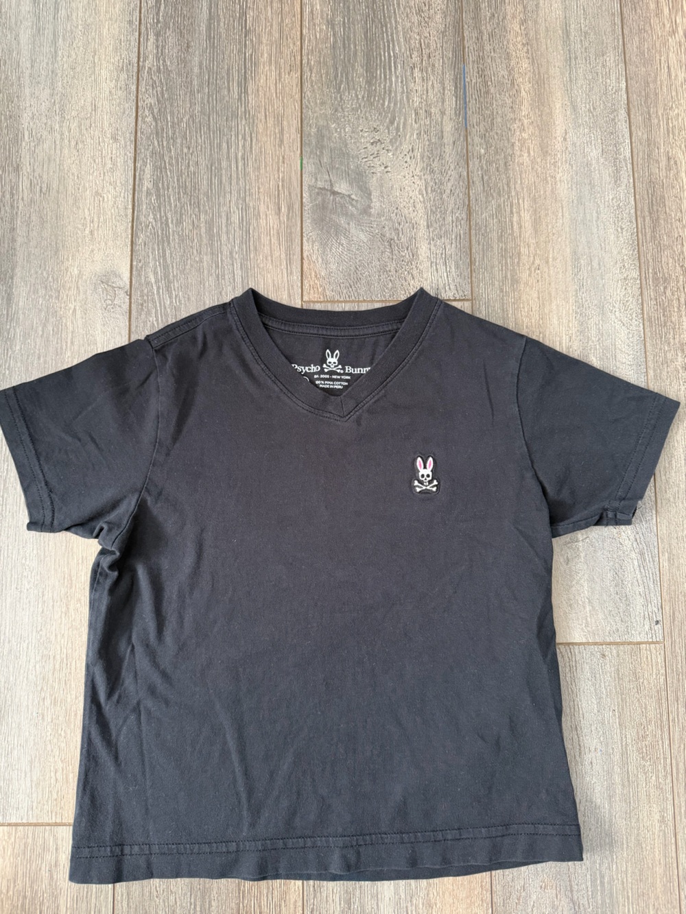 Psycho Bunny Black V-Neck Short Sleeve Tee with Pink-Eyed Logo